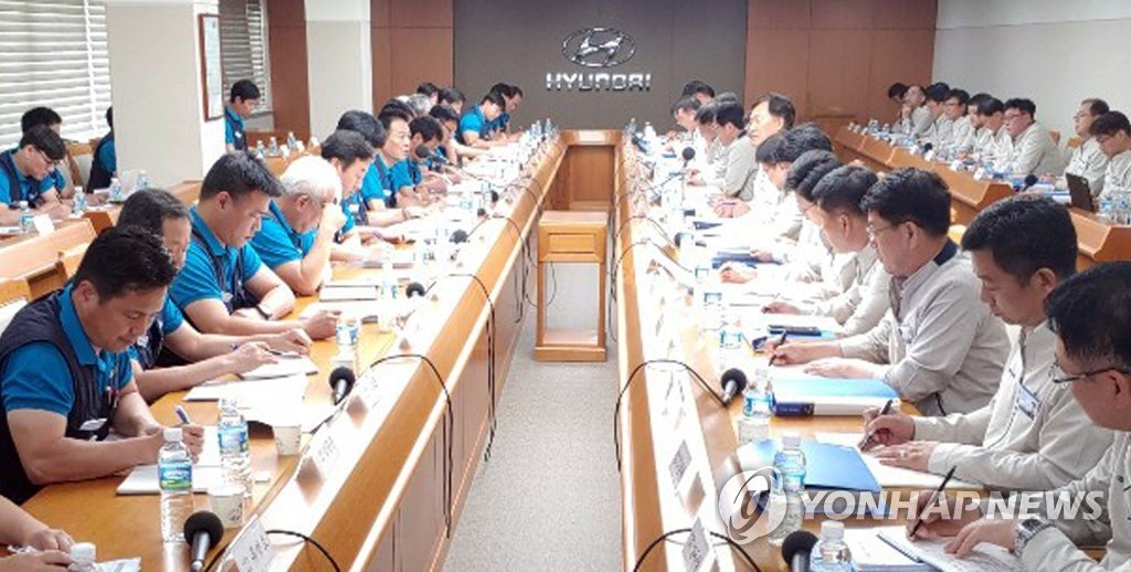 Représentants du syndicat et de la direction de Hyundai Motor Co. pour la négociation des salaires le 27/08/2019 (©Hyundai Motor pour Yonhap).